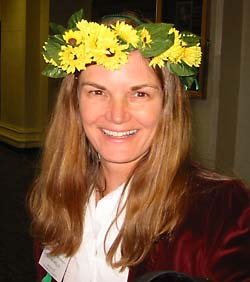 Laura, our candidate for Controller, joins the women's caucus and gets a wreath